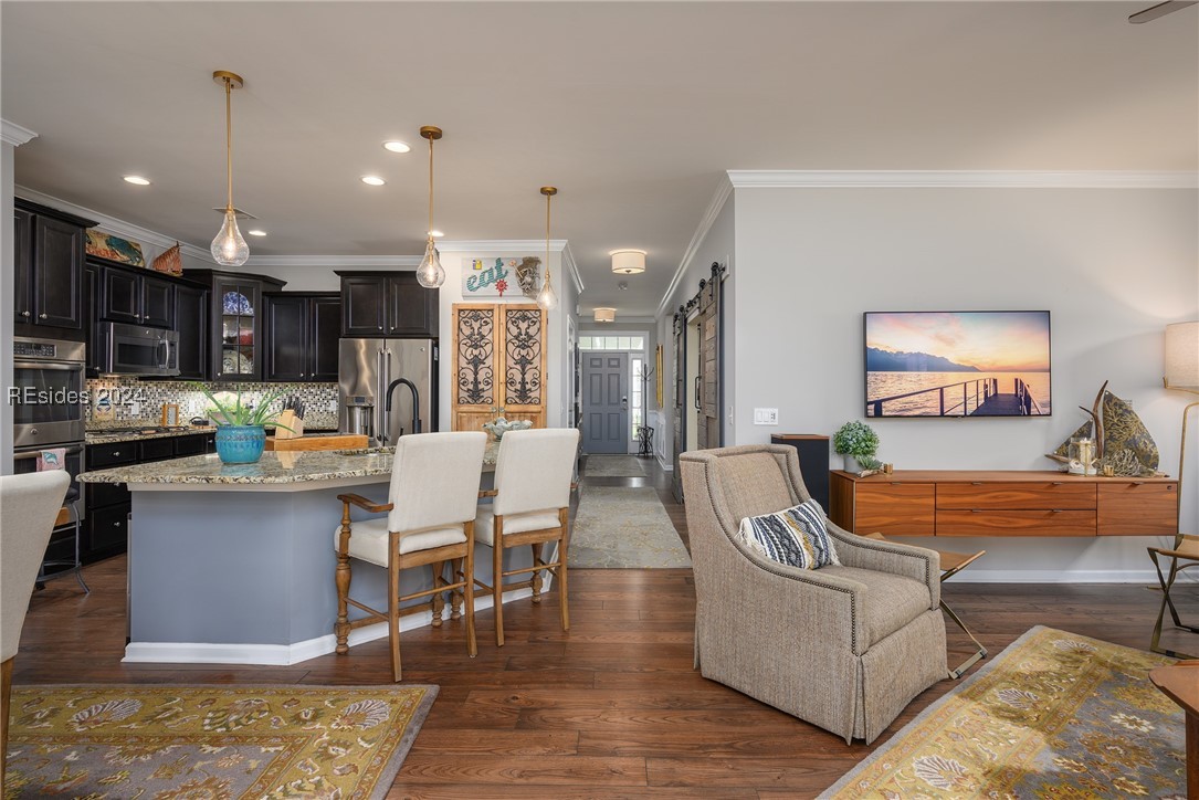 Kitchen with a kitchen breakfast bar, light stone