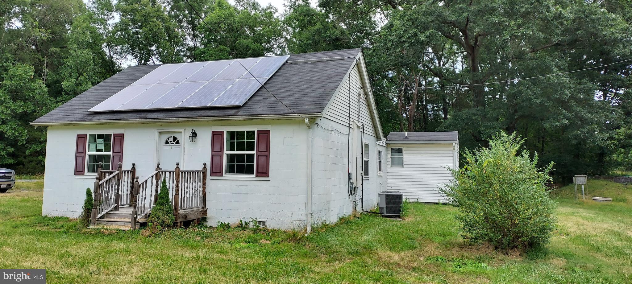 a view of a backyard of the house