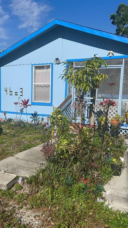 a front view of a house with yard