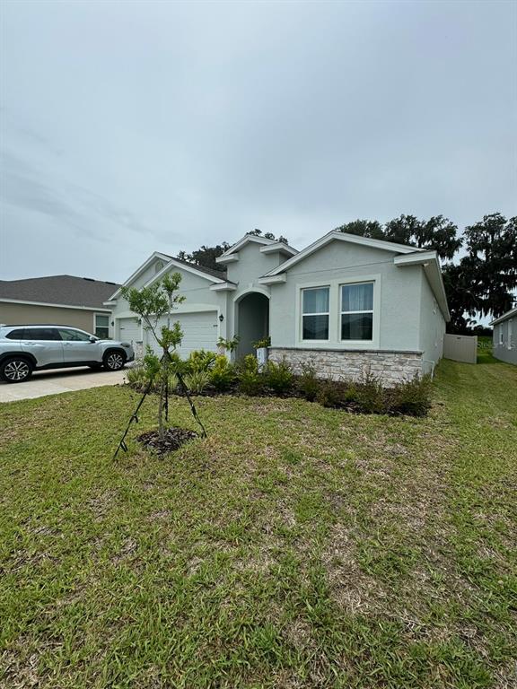 a house with trees in the background