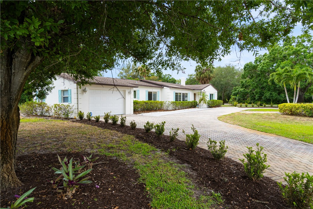 a house view with a garden space