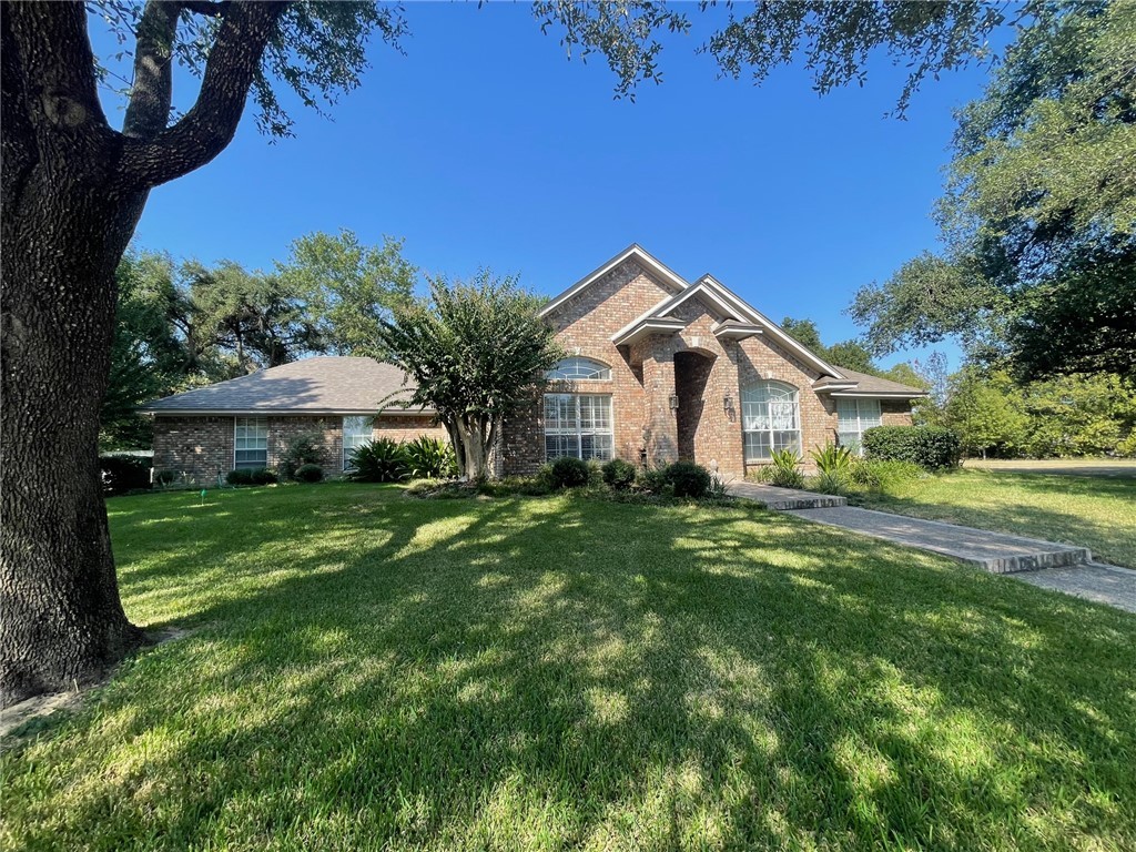 View of front of home with a front lawn