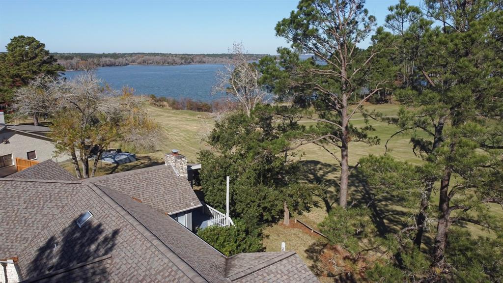 Perfectly situated with the most coveted views of the golf course and Lake Livingston