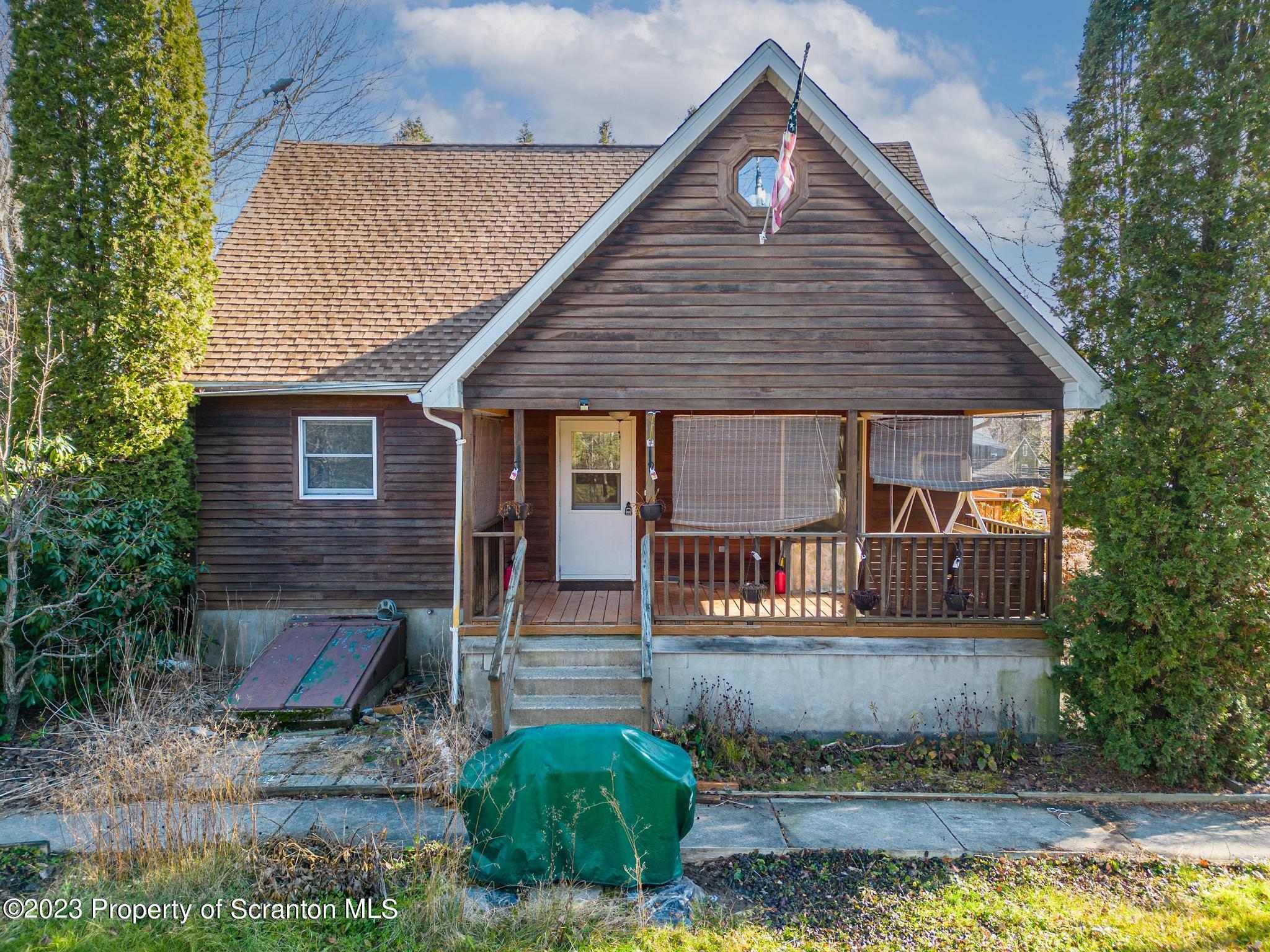 a view of a house with roof deck