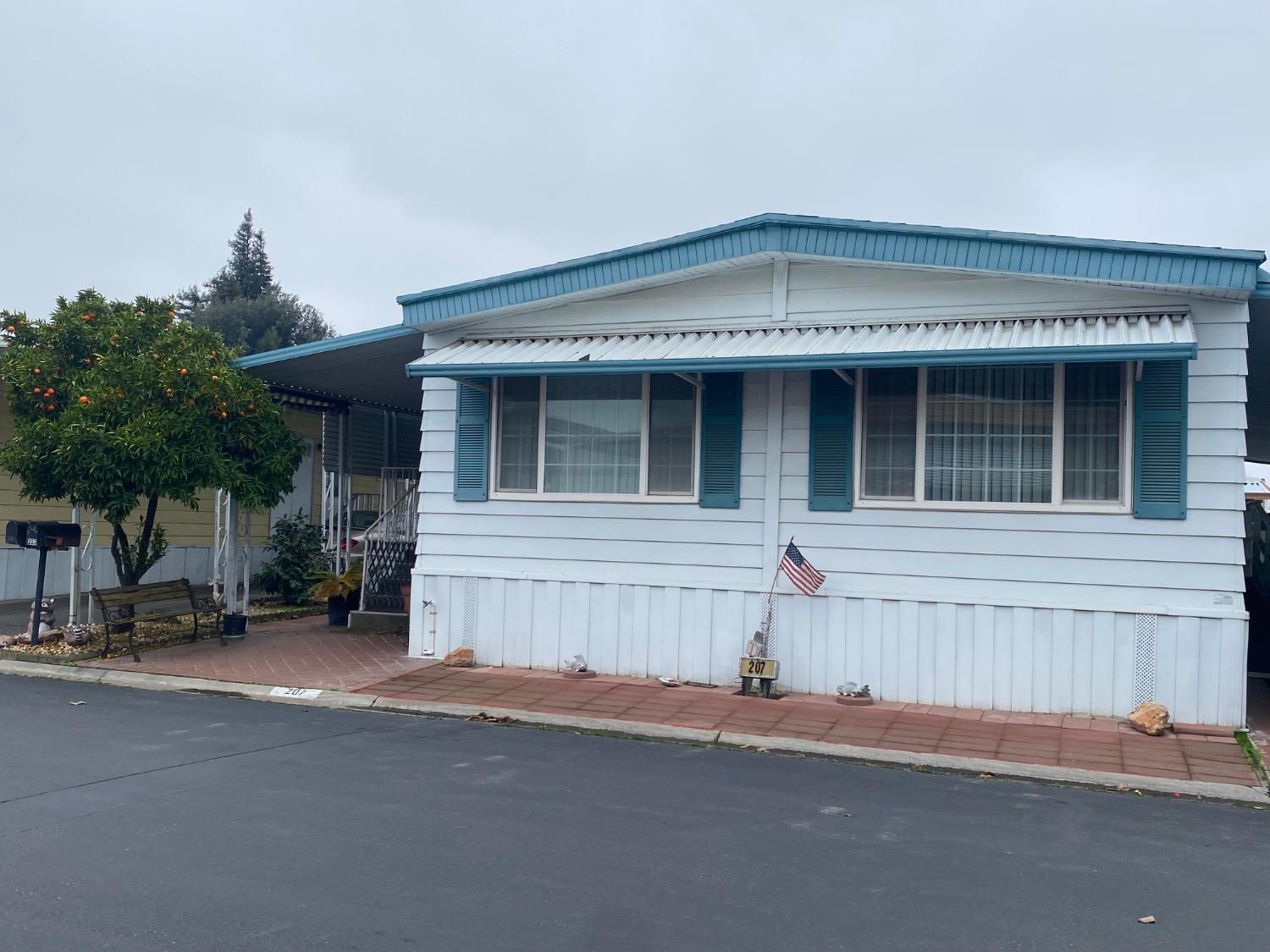 a front view of a house with a garage