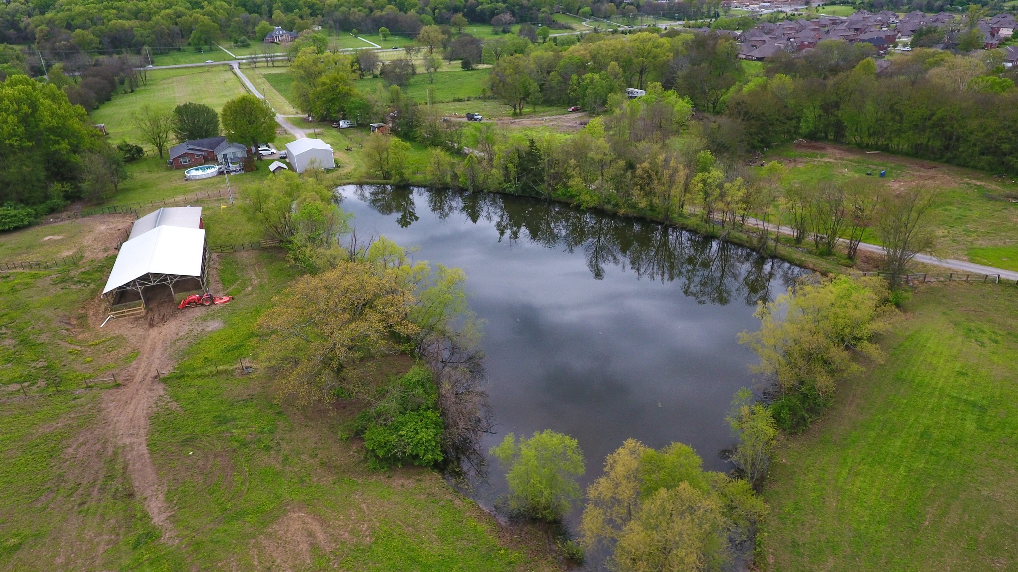 a view of a lake with a yard