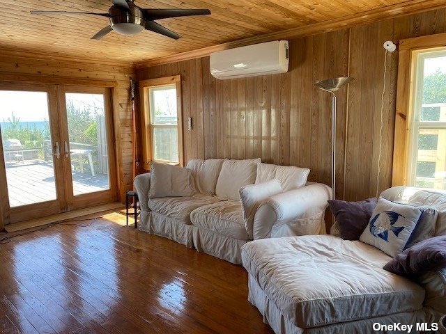 a spacious bedroom with two beds and a large window