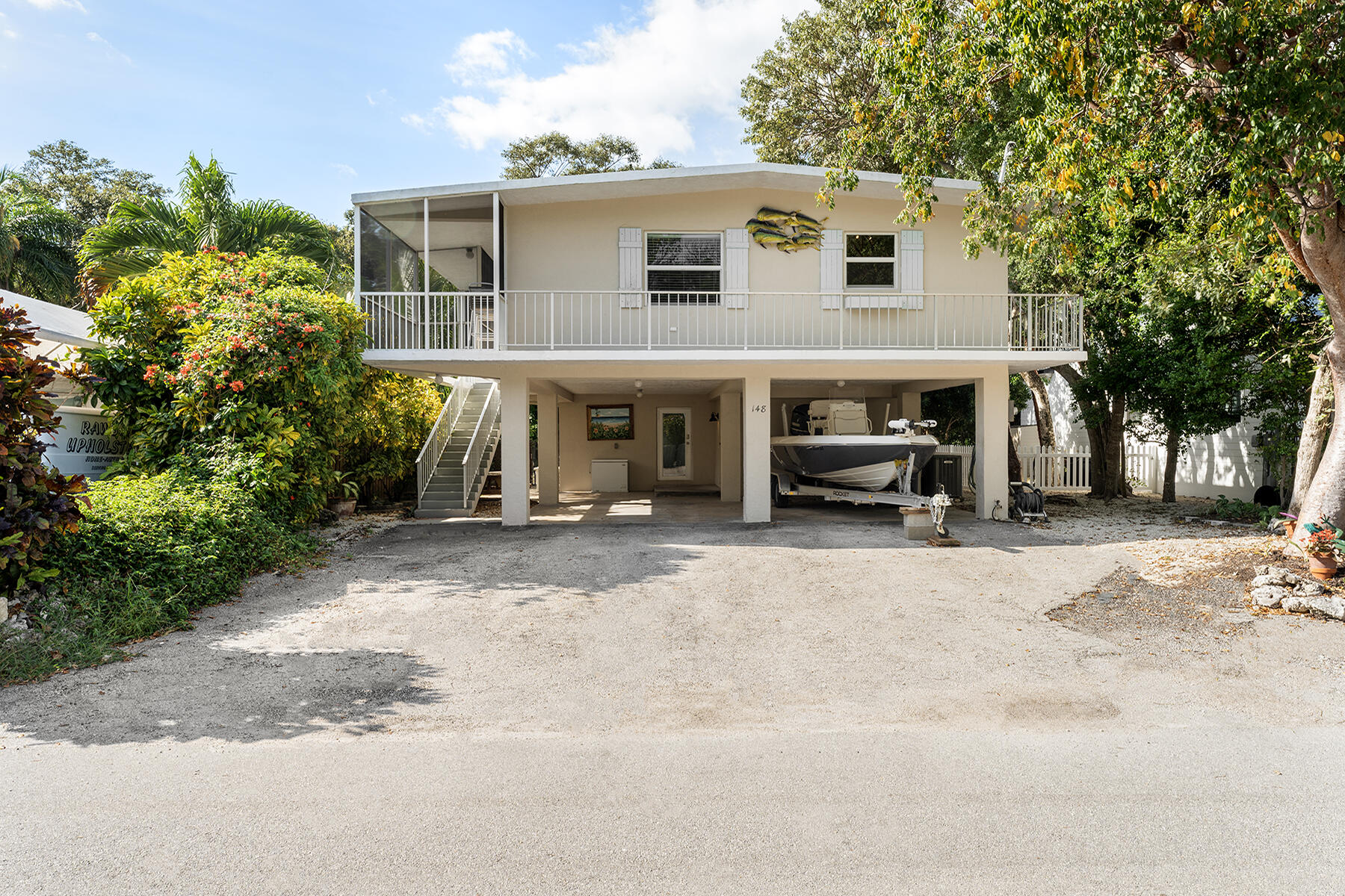 a view of a car park in front of house