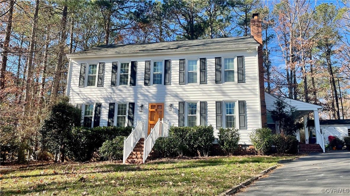 front view of house with a yard