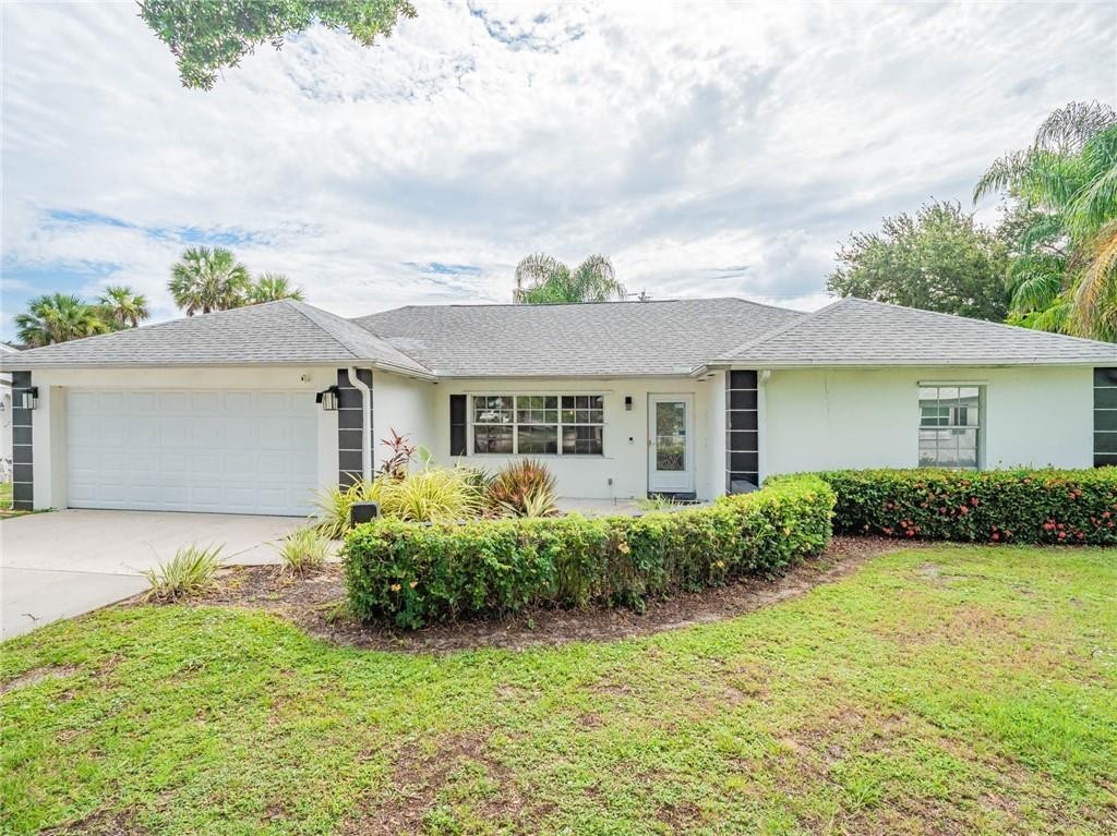 front view of a house with a yard