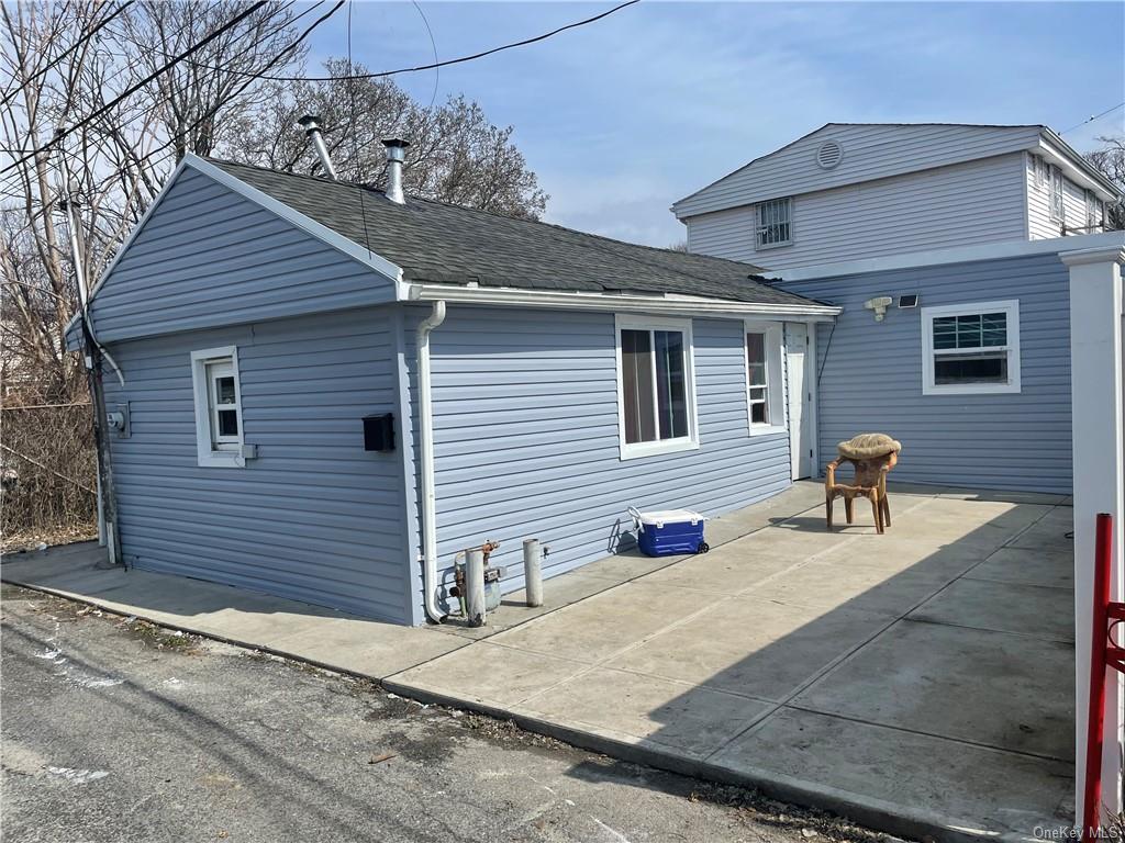 Back of property with a patio area