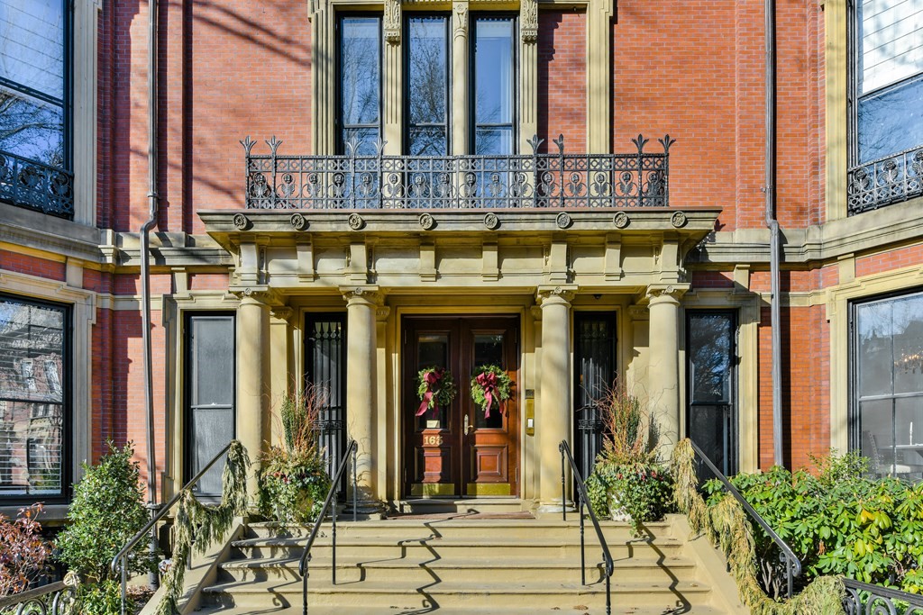 a view of a building with a porch area