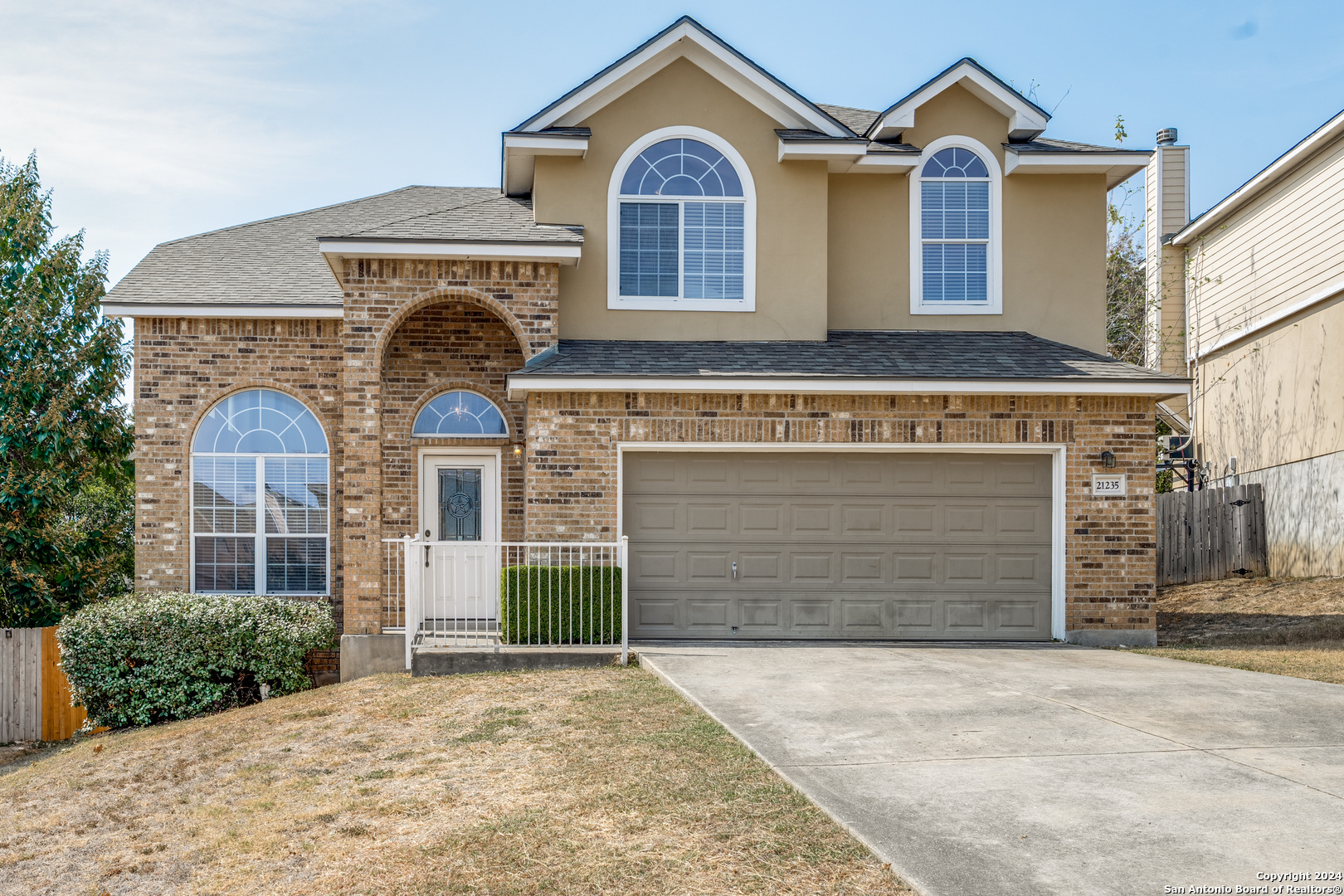 front view of a house with a garage