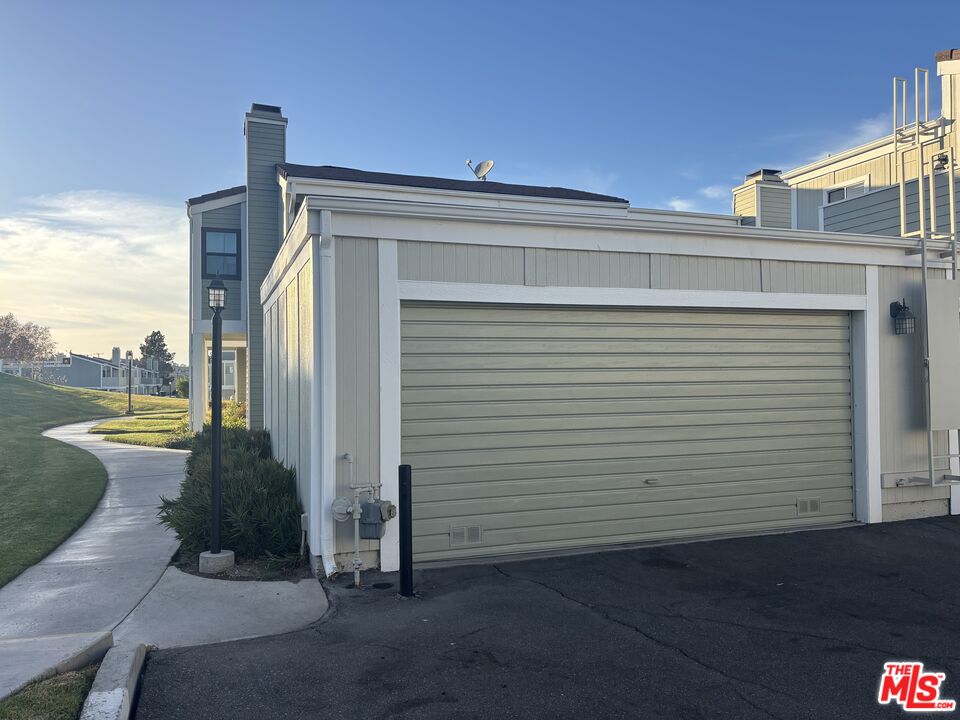 a view of a back yard of the house