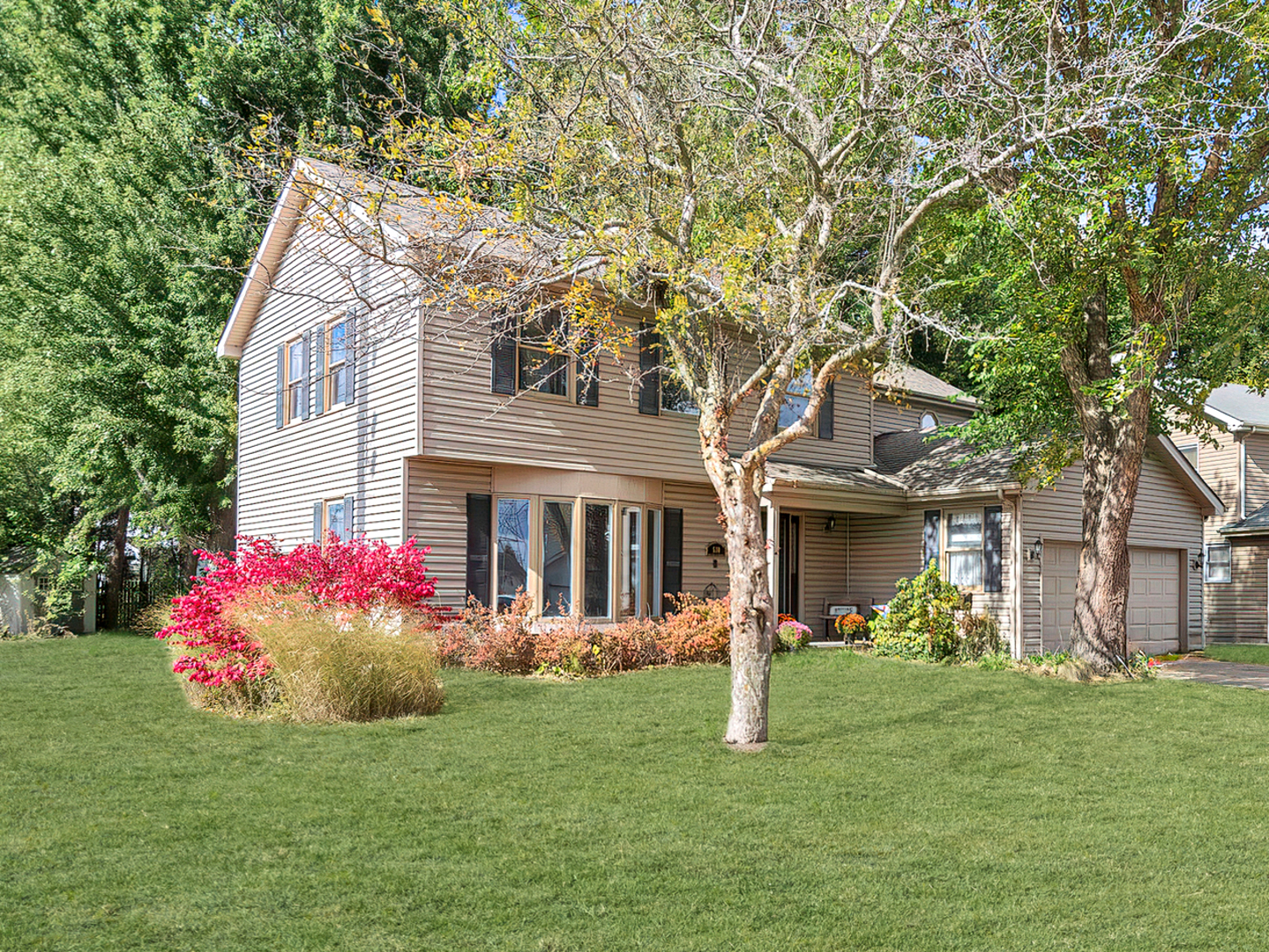 a front view of house with yard