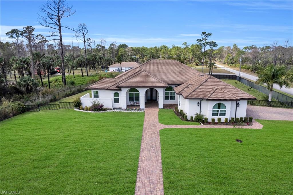 a aerial view of a house with garden