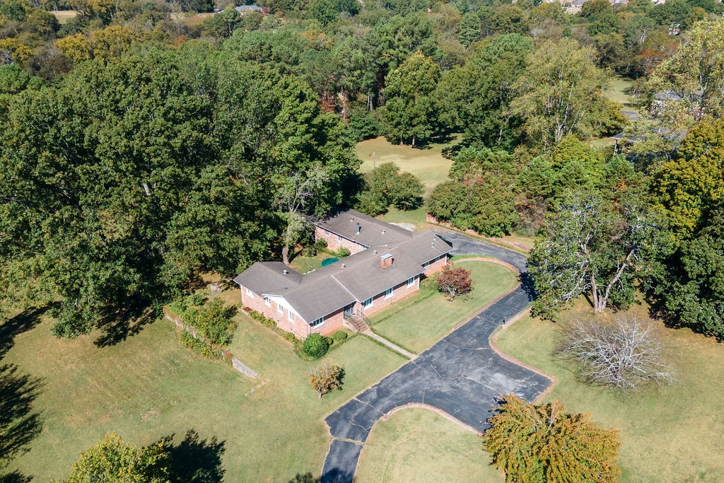 an aerial view of residential house with outdoor space