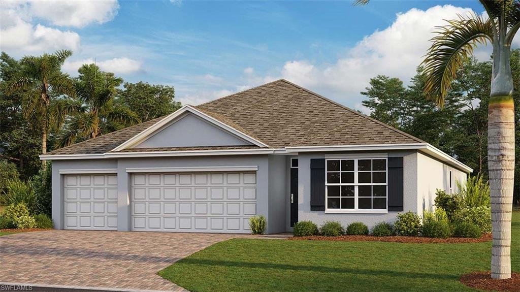 Ranch-style house with a front yard and a garage