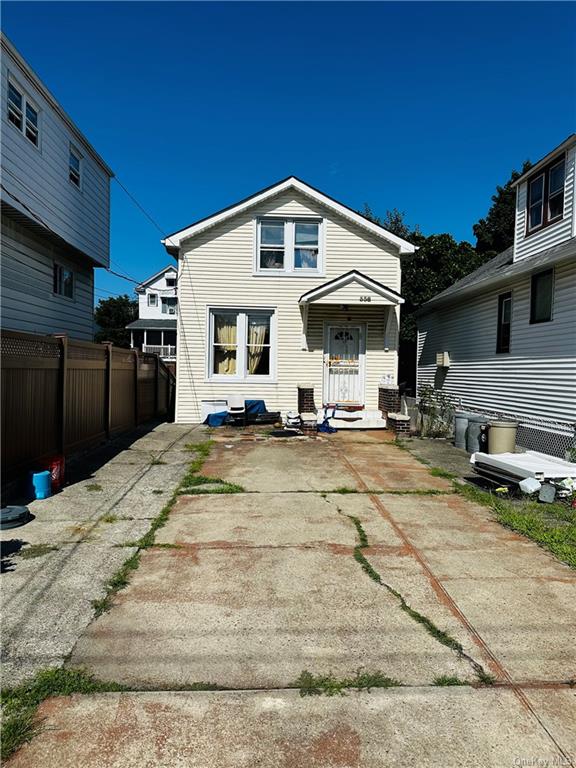 a view of a house with a patio