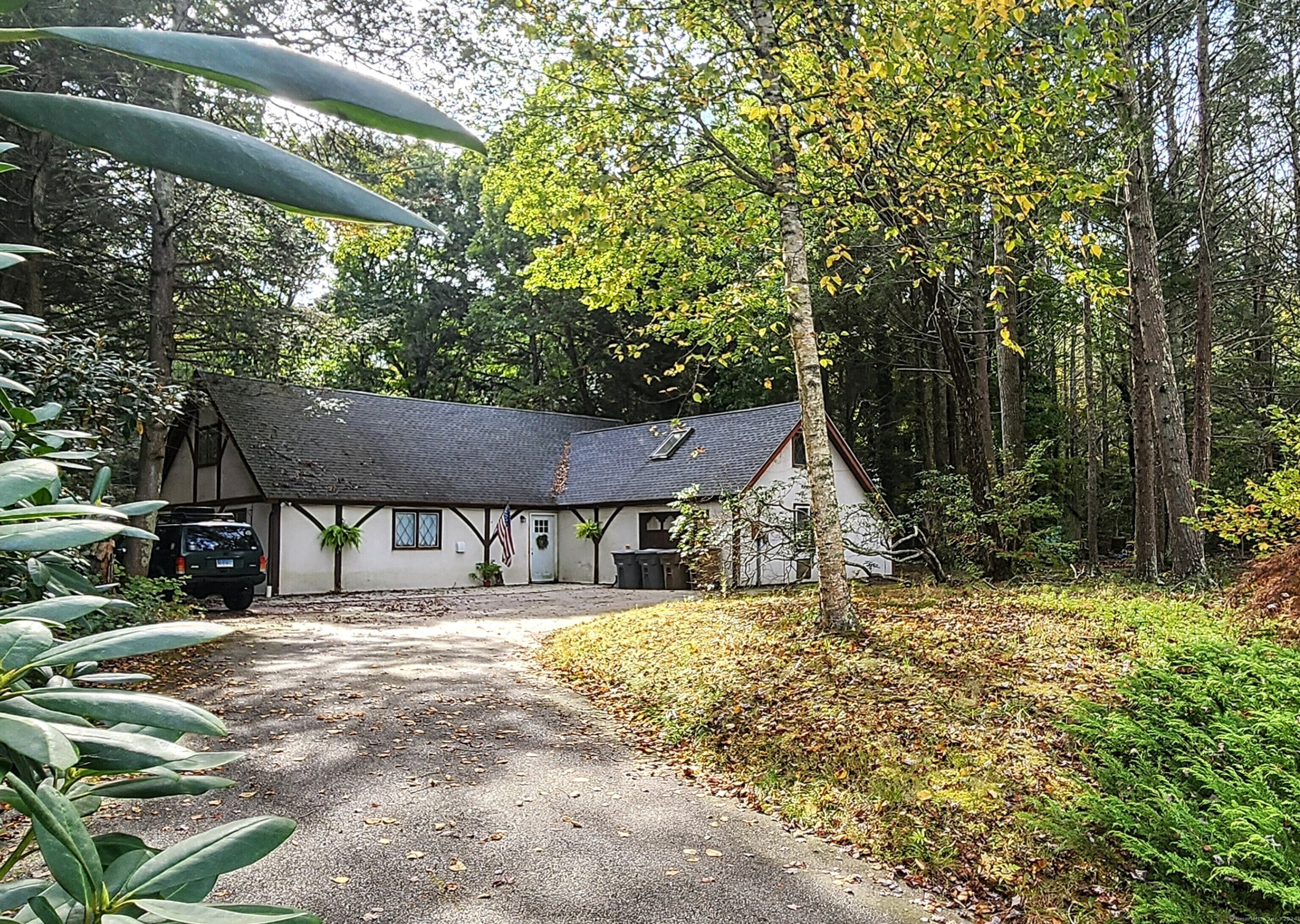 a house with trees in the background