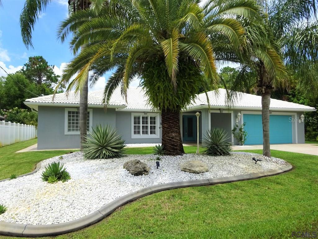 a view of a house with a swimming pool