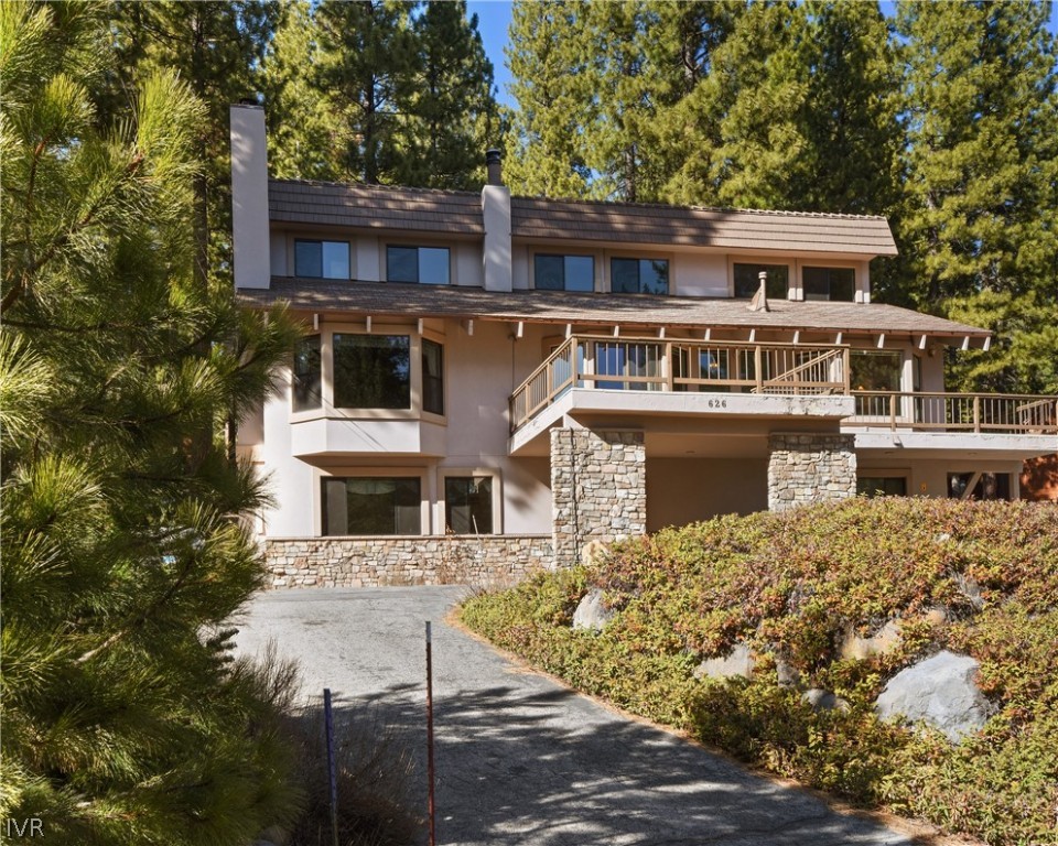 front view of a house with a small yard