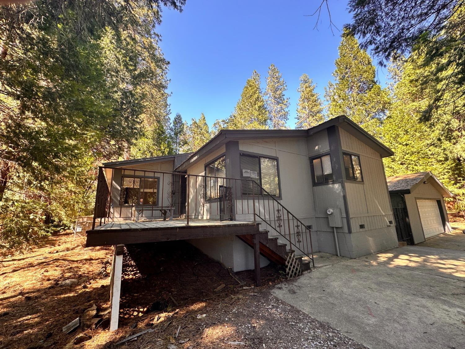 a house with trees in the background