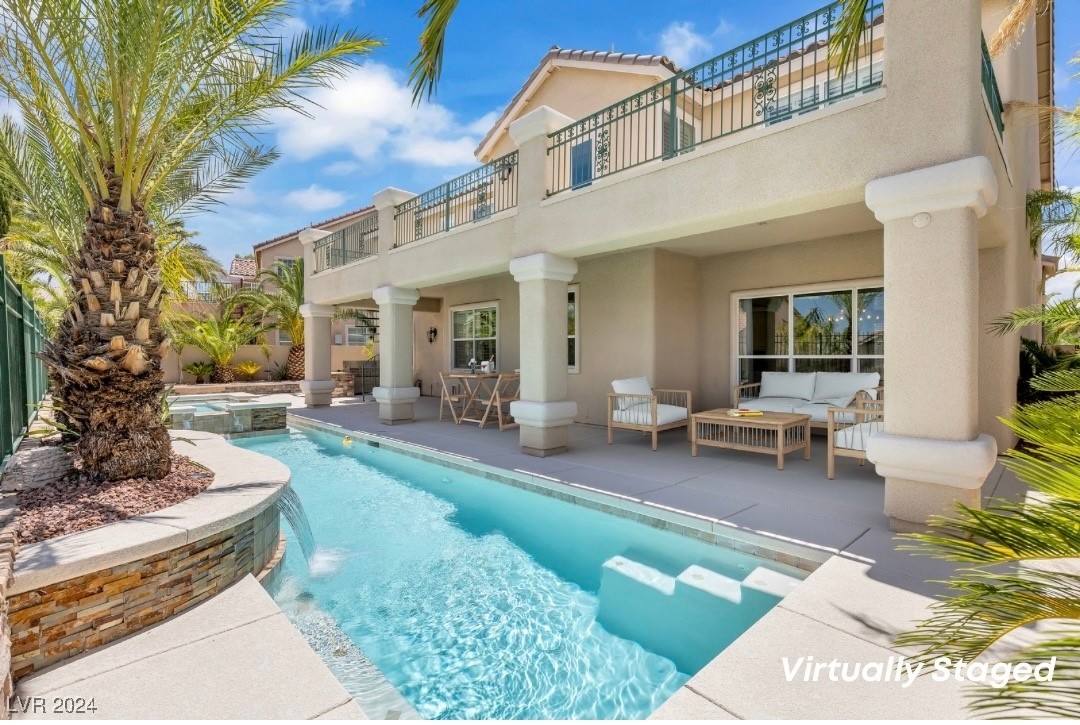 Relax in poolside luxury.  Virtually staged.