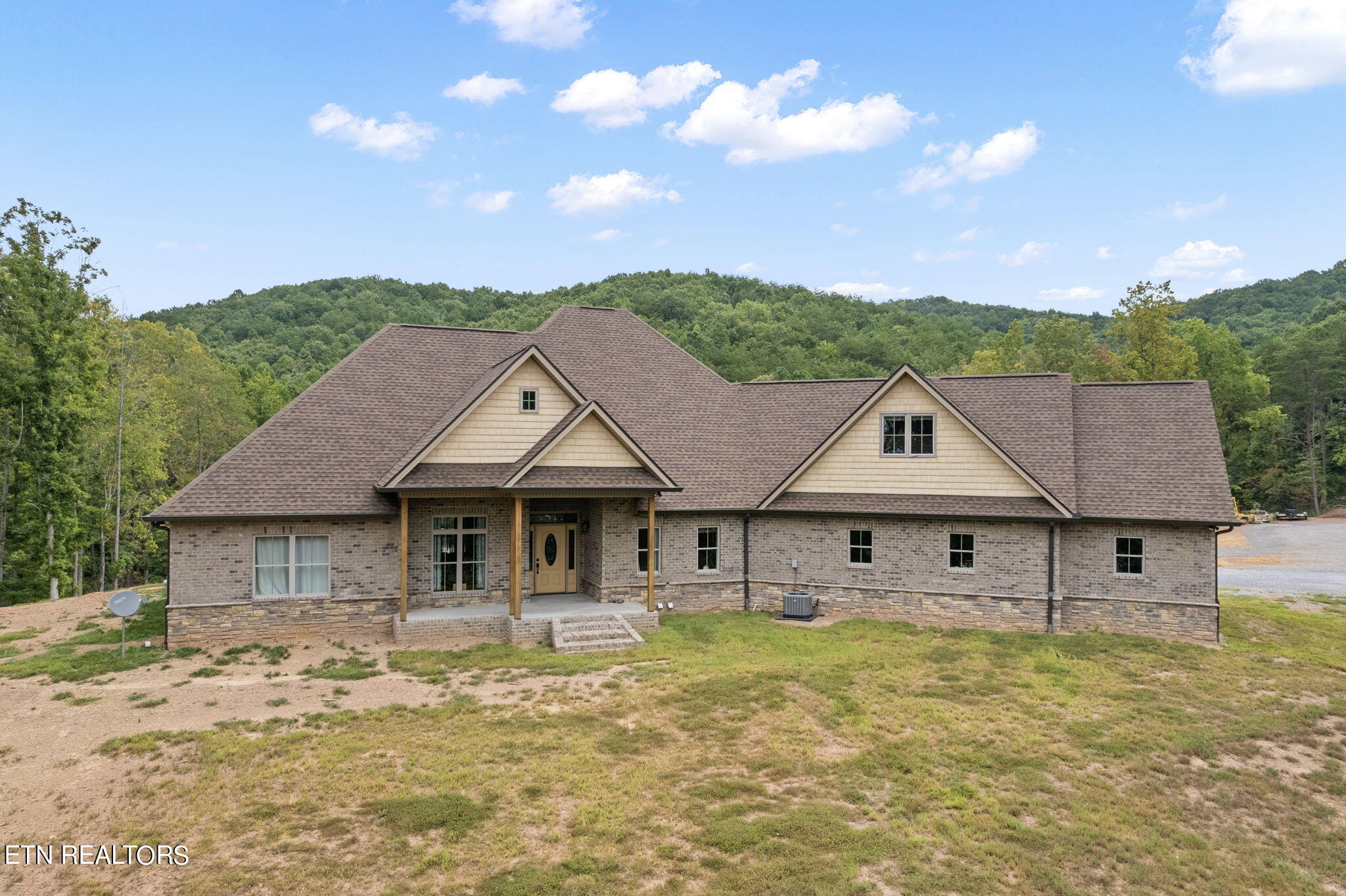 Brick & Stone Custom Built Home