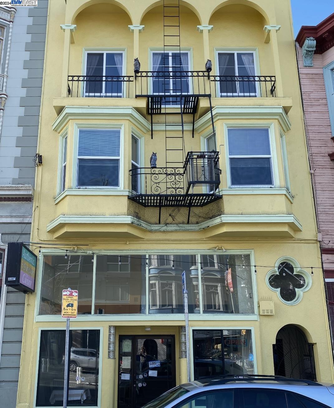 a front view of a building with glass windows