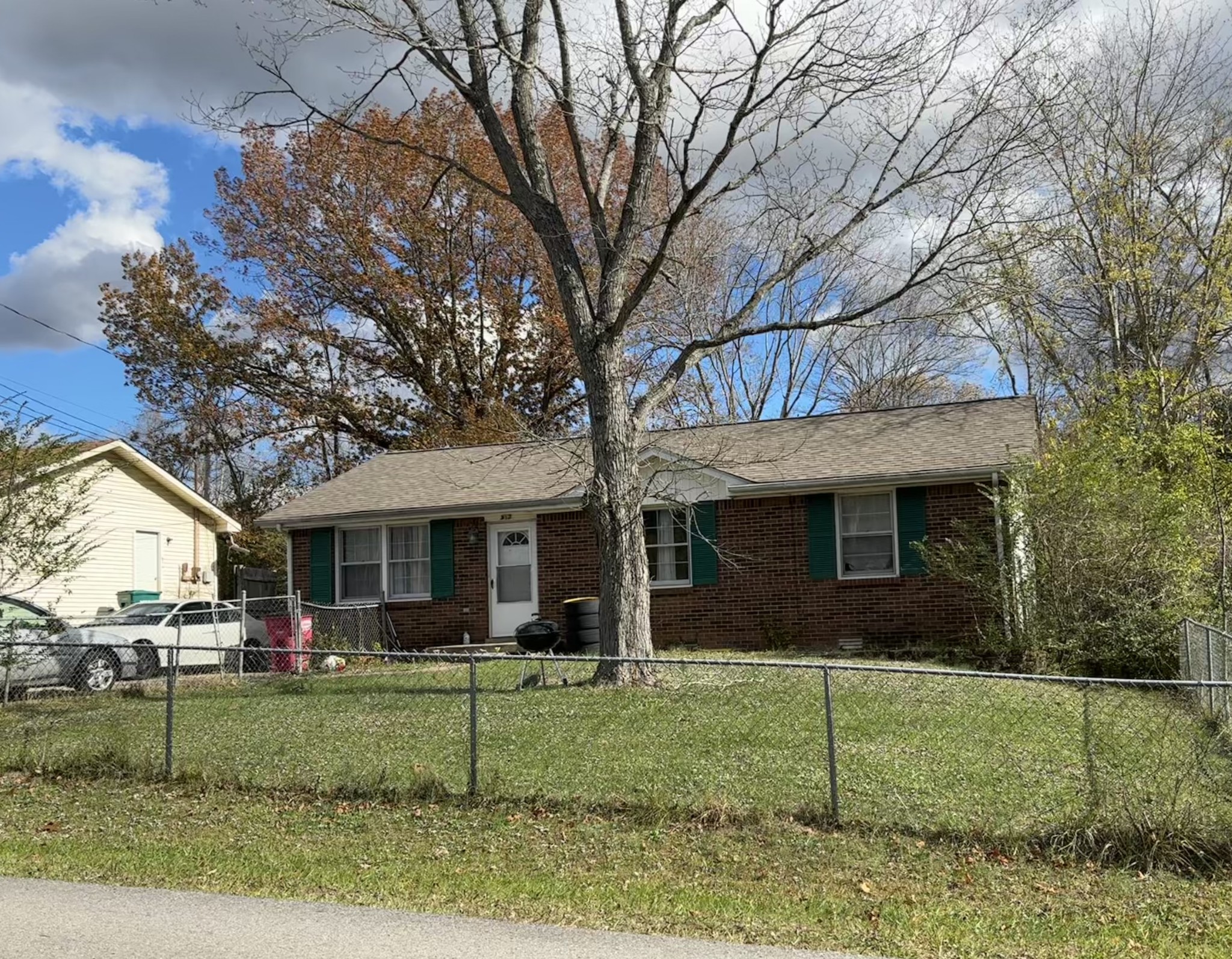 a view of a yard in front of a house