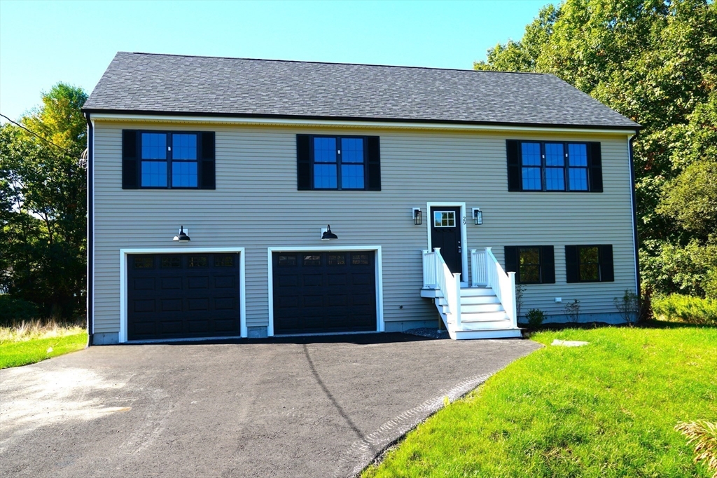 a front view of house with yard