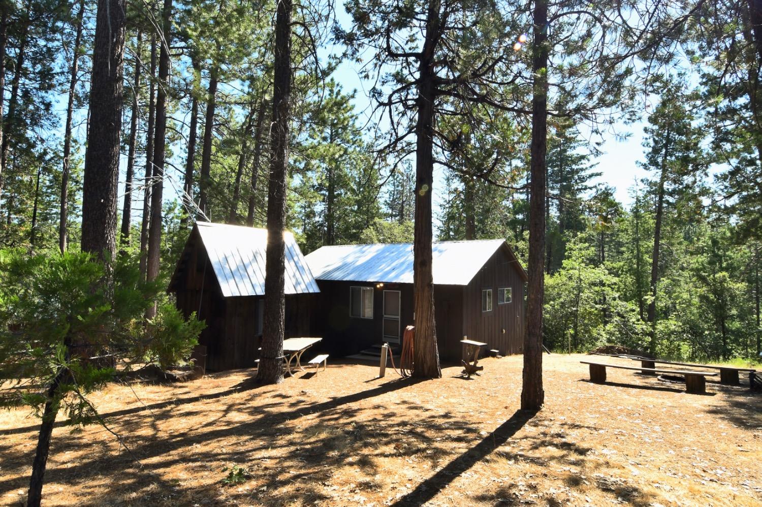 a view of a backyard of the house