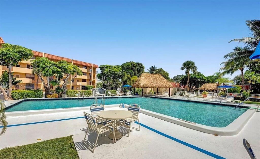 a view of a swimming pool and outdoor space