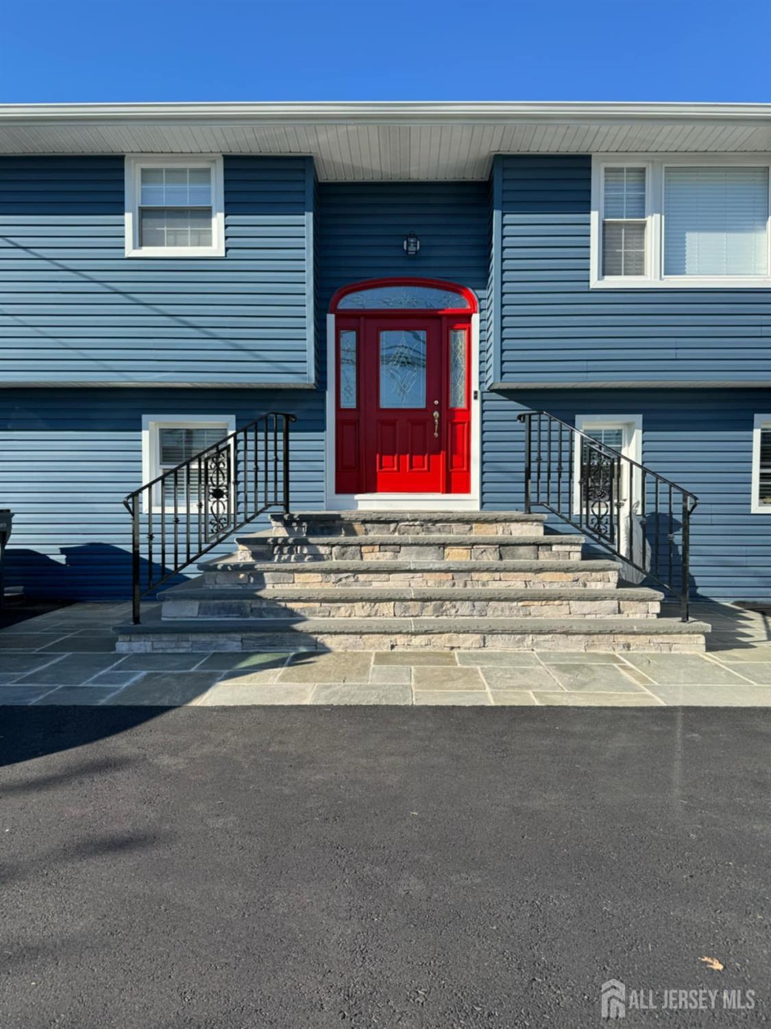 a front view of a house with garage