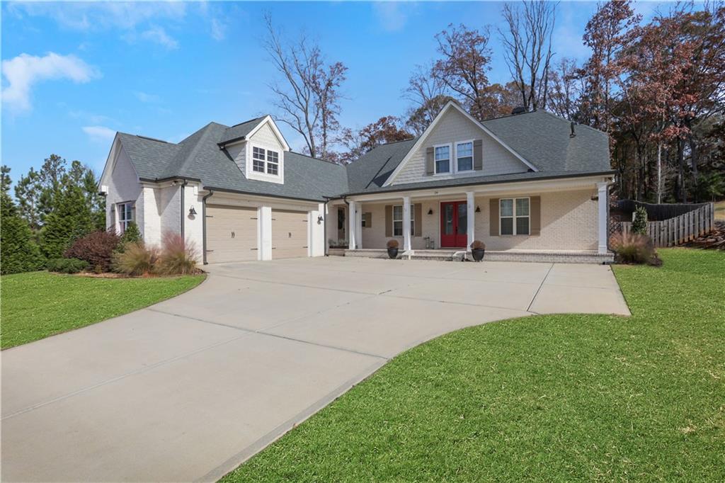 front view of a house with a yard