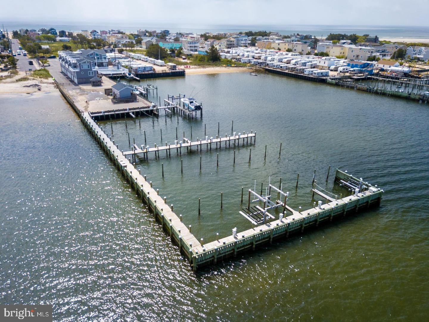 an aerial view of a house with a lake view