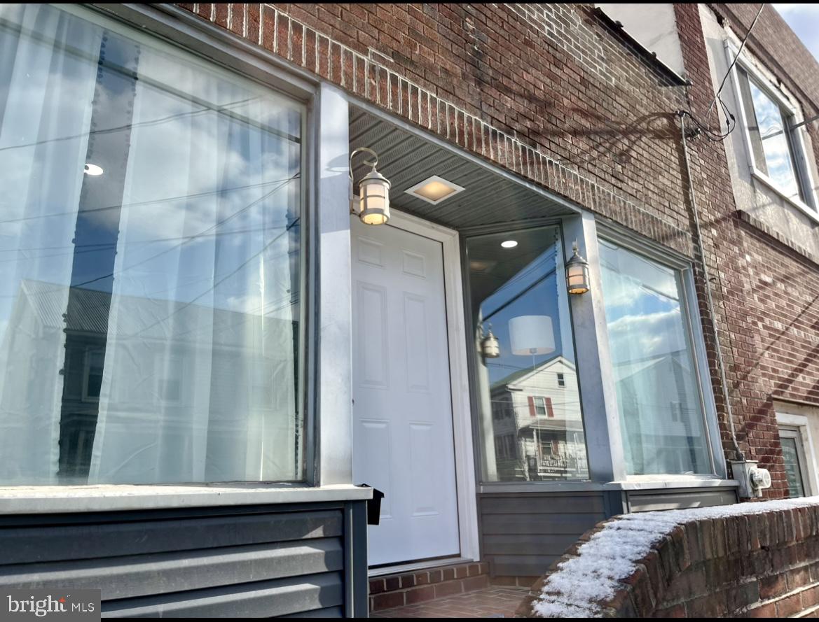 a view of a glass door of the house