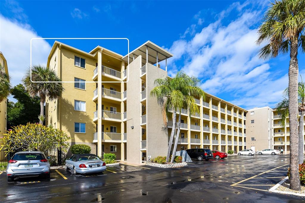 a front view of a building with street view