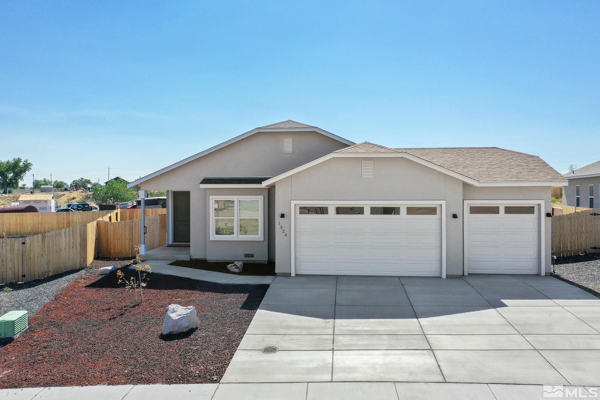 a front view of a house with yard