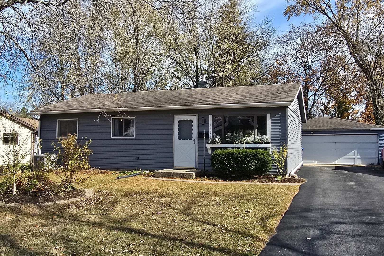 front view of a house with a yard