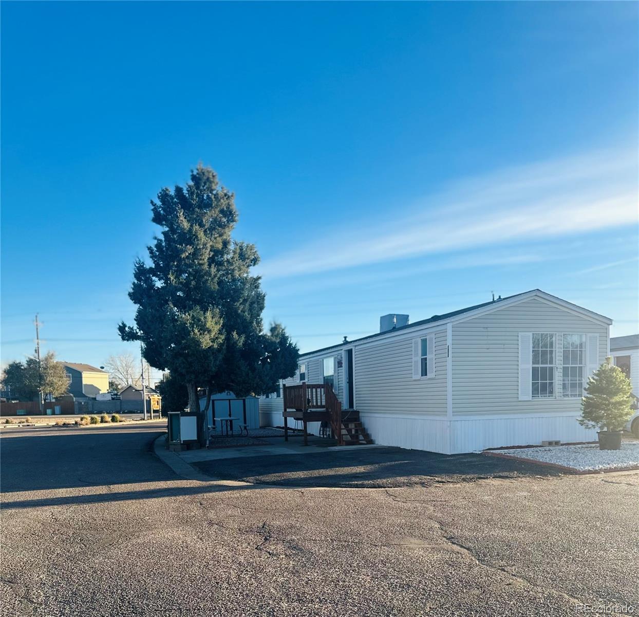 front view of a house with a street