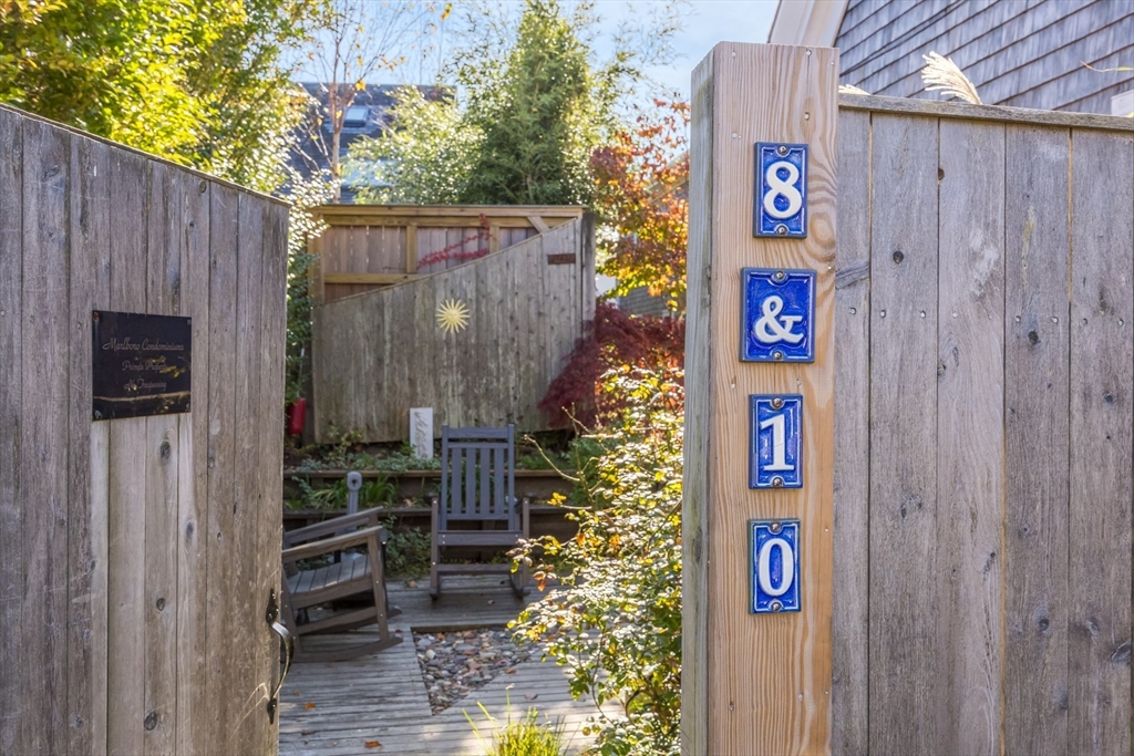 a sign board with an outdoor space