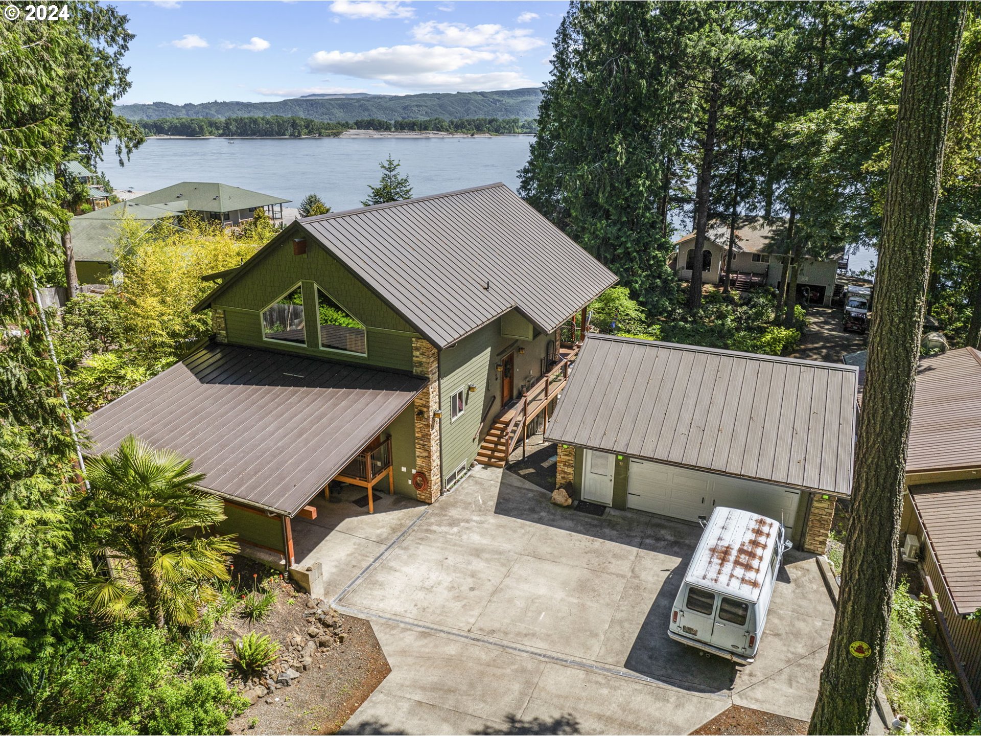 an aerial view of a house having patio yard and a patio