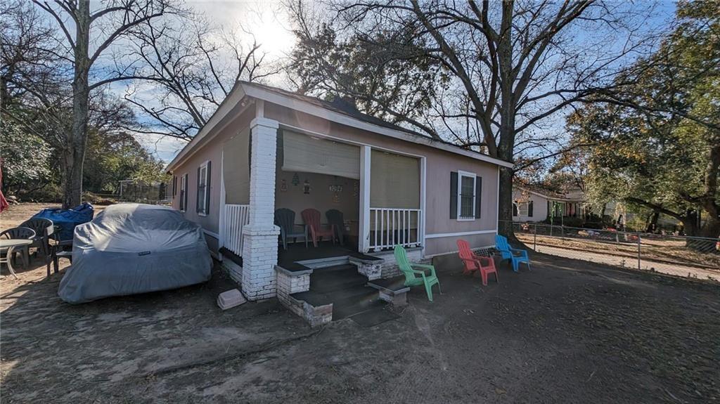 a view of a patio with a yard