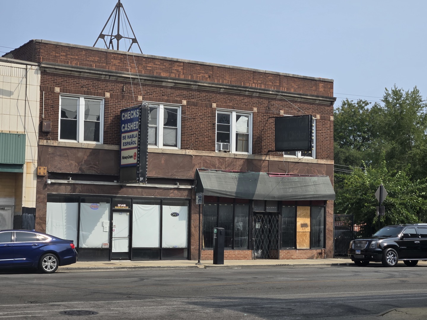 a front view of a building with street