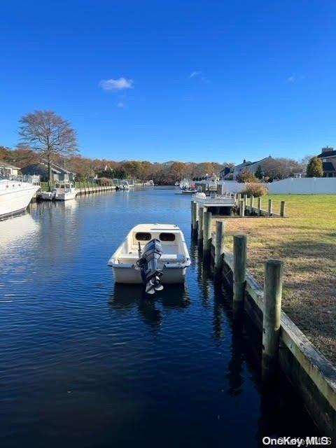 a car parked on the side of a river