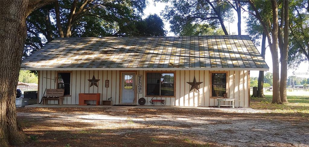 a view of a house with a porch