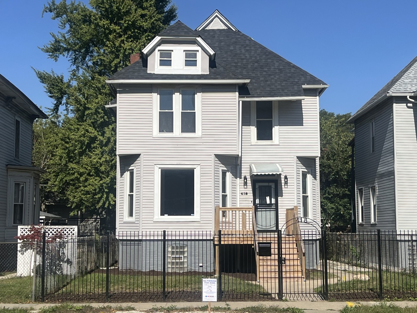 a front view of a house with a porch