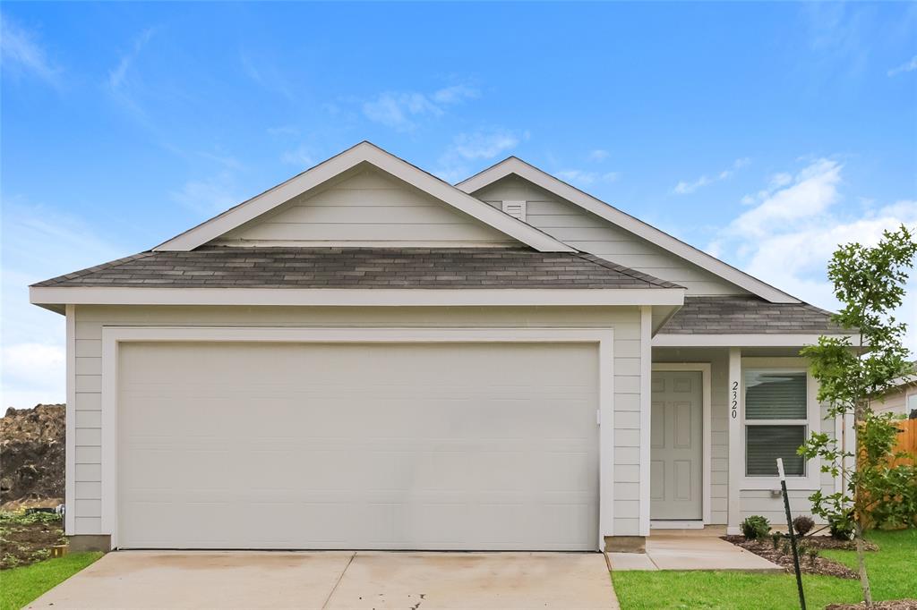 a view of a house with garage